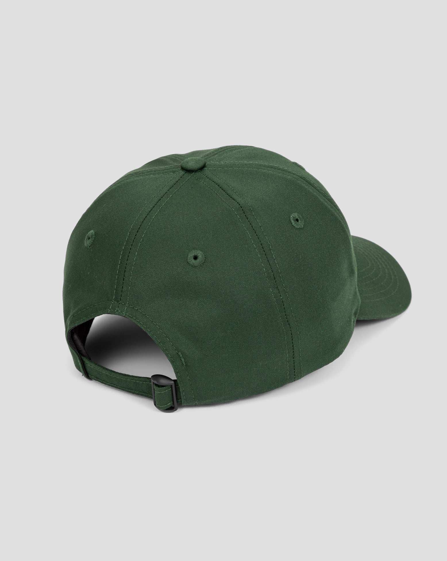 Imagem de estúdio mostrando a parte de trás do boné Volcom verde com fechamento ajustável, perfeita para exibir o acabamento do acessório.